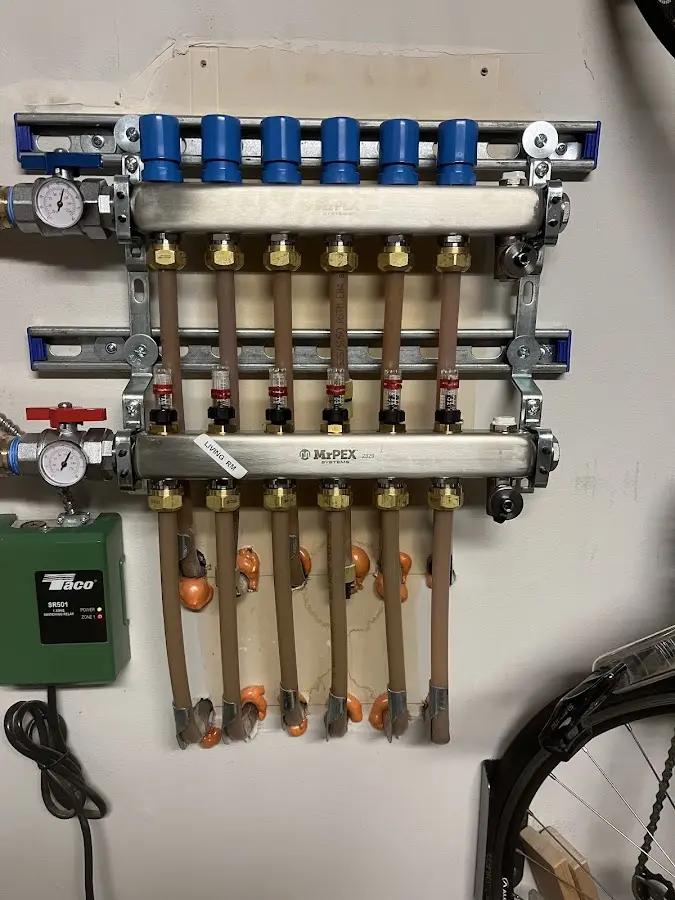 Plumber performing Water Heater Repair at a residential property in East Caln